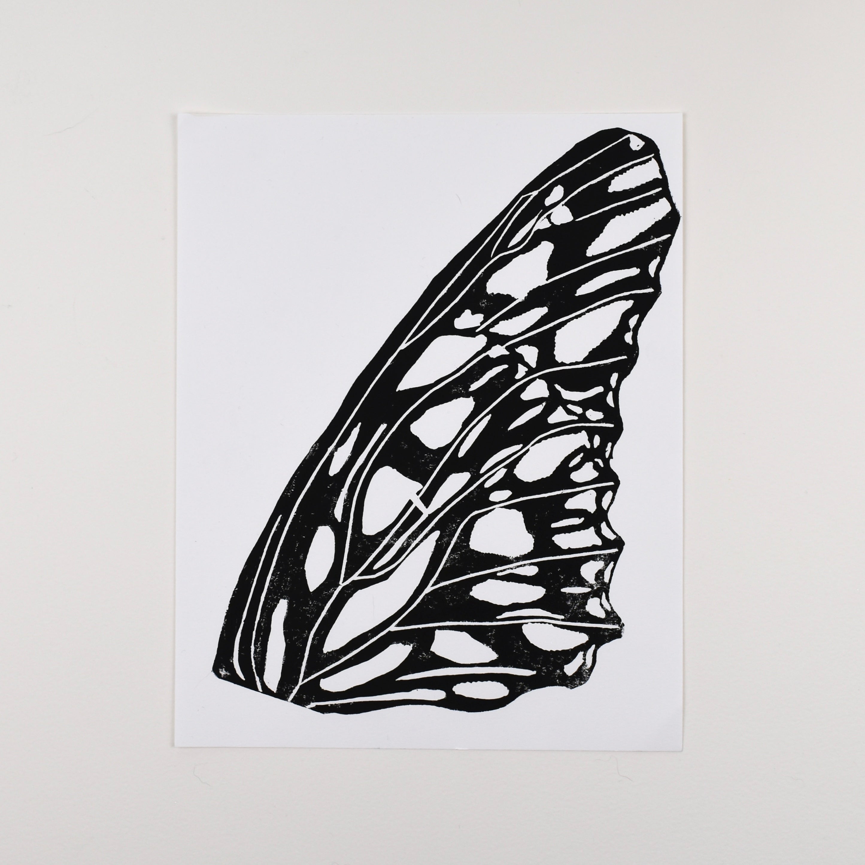 Hand-printed black and white linocut art of a gulf fritillary wing, unframed